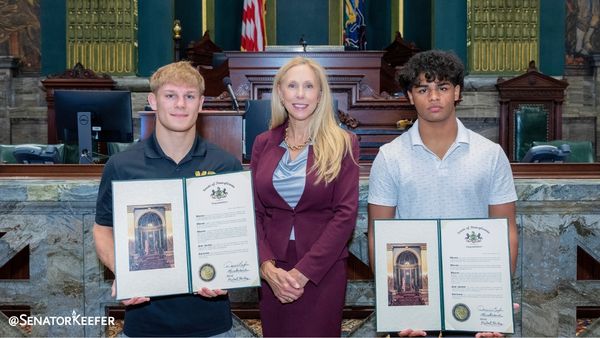 Senator Keefer with state wrestling champions Camden Baum and Kavin Muyleart.