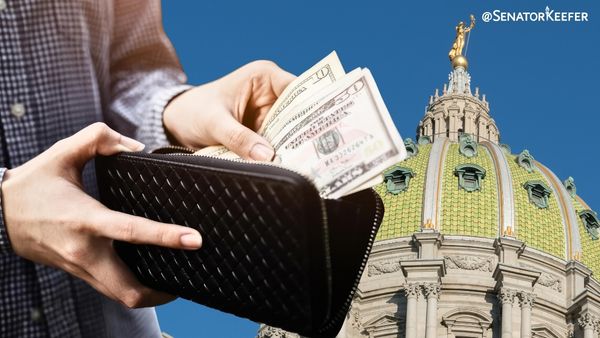 Person with wallet open and taking out cash and image of Pennsylvania Capitol dome in the background.