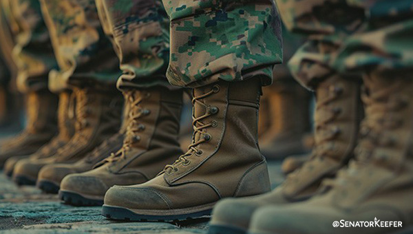 service men and women in camo uniforms and boots.